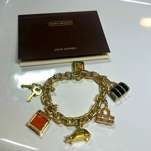LOUIS VUITTON 2003 18KT GOLD CHARM BRACELET W/ 5 CHARMS